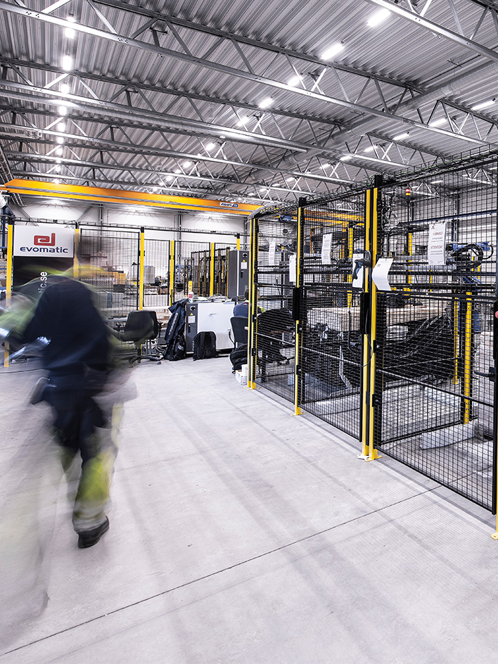 Stationary automated storage and packaging machines, including conveyors, sorters, and palletizers in a warehouse setting